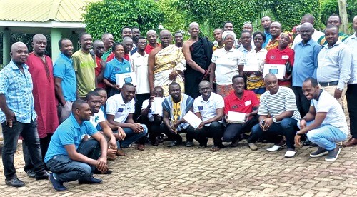 The farmers and community leaders at the handover ceremony.